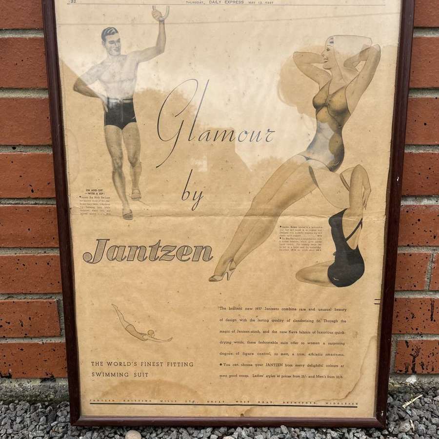 Framed Glamour Swimwear Advertisement