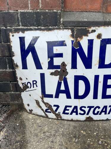 Kendall’s Furs Enamel Sign