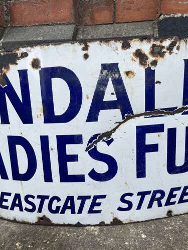Kendall’s Furs Enamel Sign